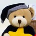 خرید عروسک موزیکال نخ‌کش خرس Jolly Baby 